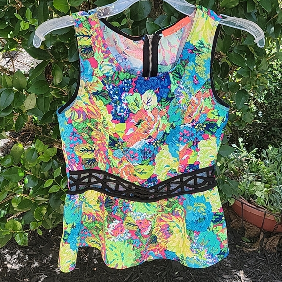 Vici Tops - Vintage Peplum floral cut Sleeveless top with zipper. Total BARBIE VIBE!!! NEW